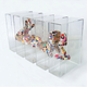 Illustration for article titled Hundreds Of Beautiful Figures Melted And Chopped Up For Art